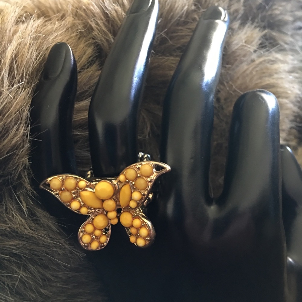 Gold faceted stone butterfly stretch ring
